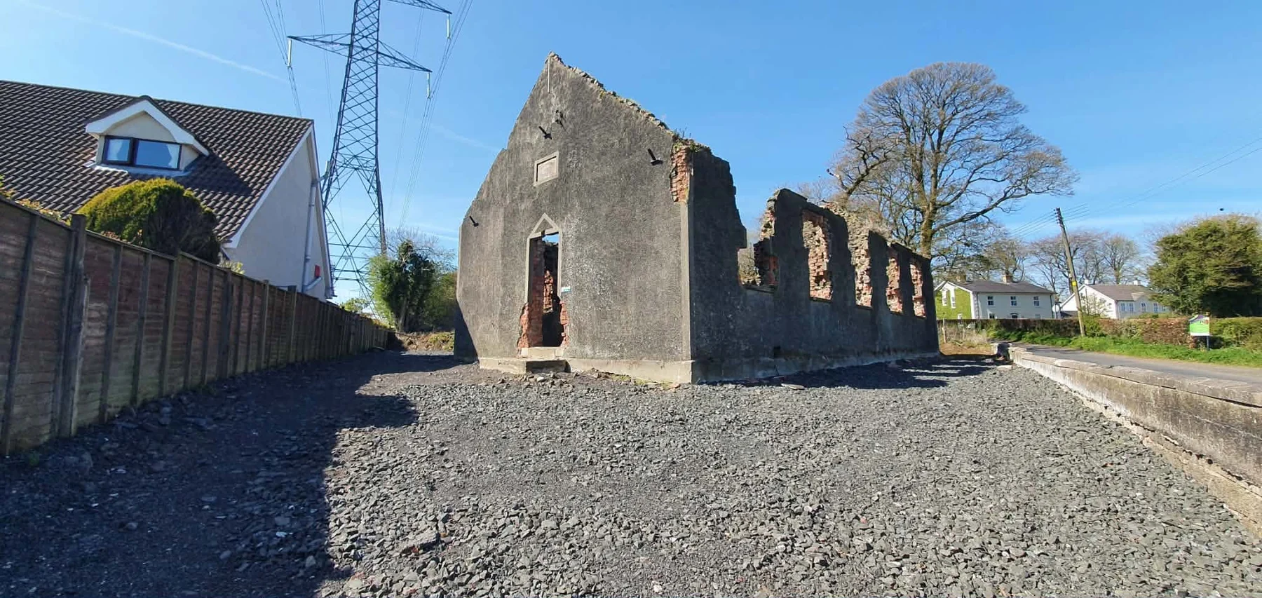 Cleared ground around the surviving walls of Roughfort Orange Hall