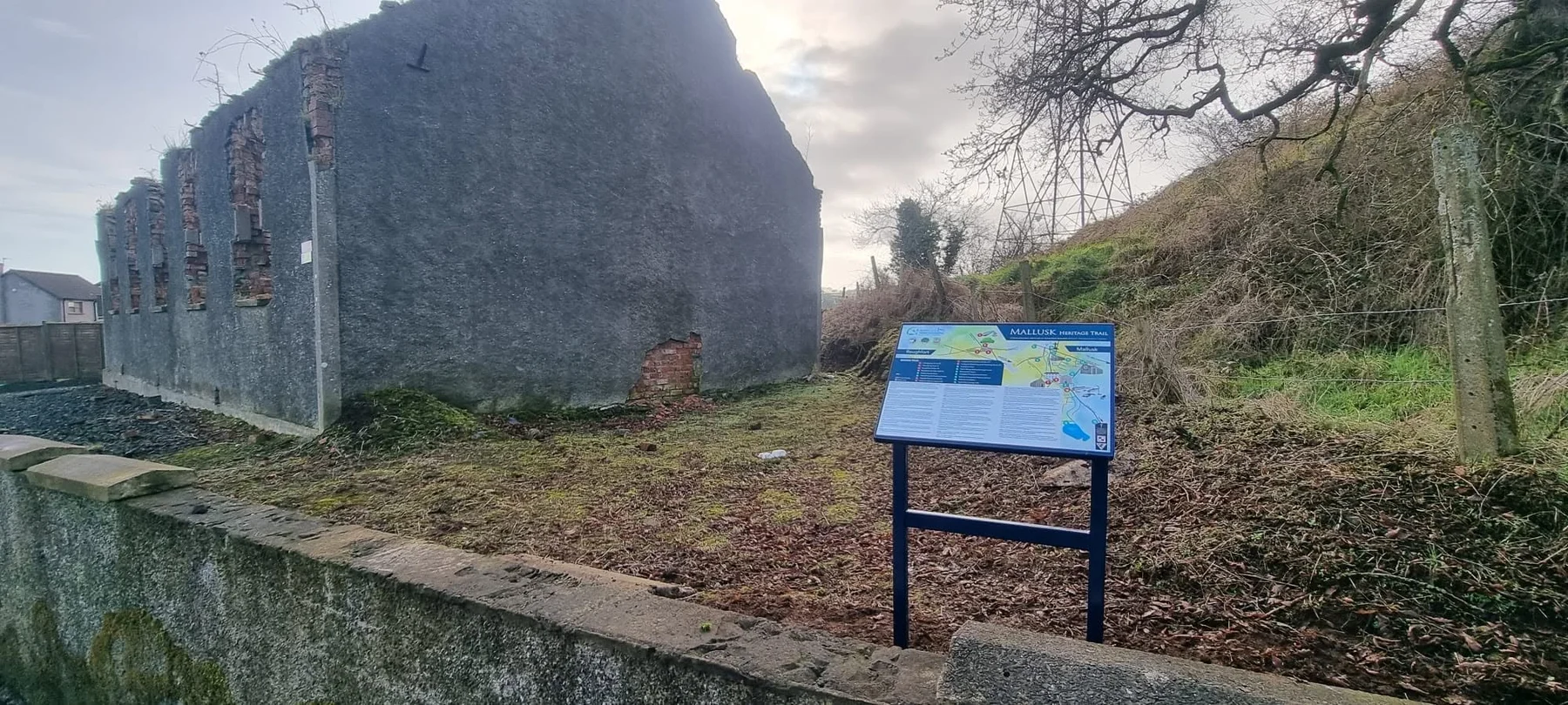 Roughfort heritage interpretation board beside the former hall